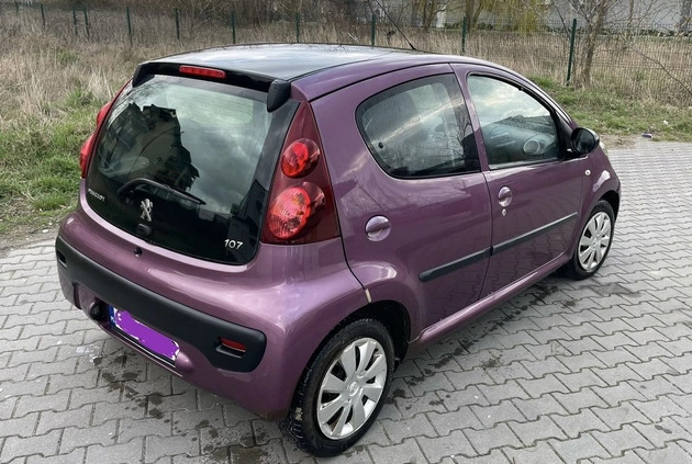 Peugeot 107 cena 17400 przebieg: 74900, rok produkcji 2013 z Toruń małe 11